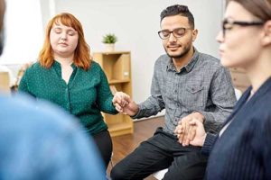 therapy group meets at mental health treatment center